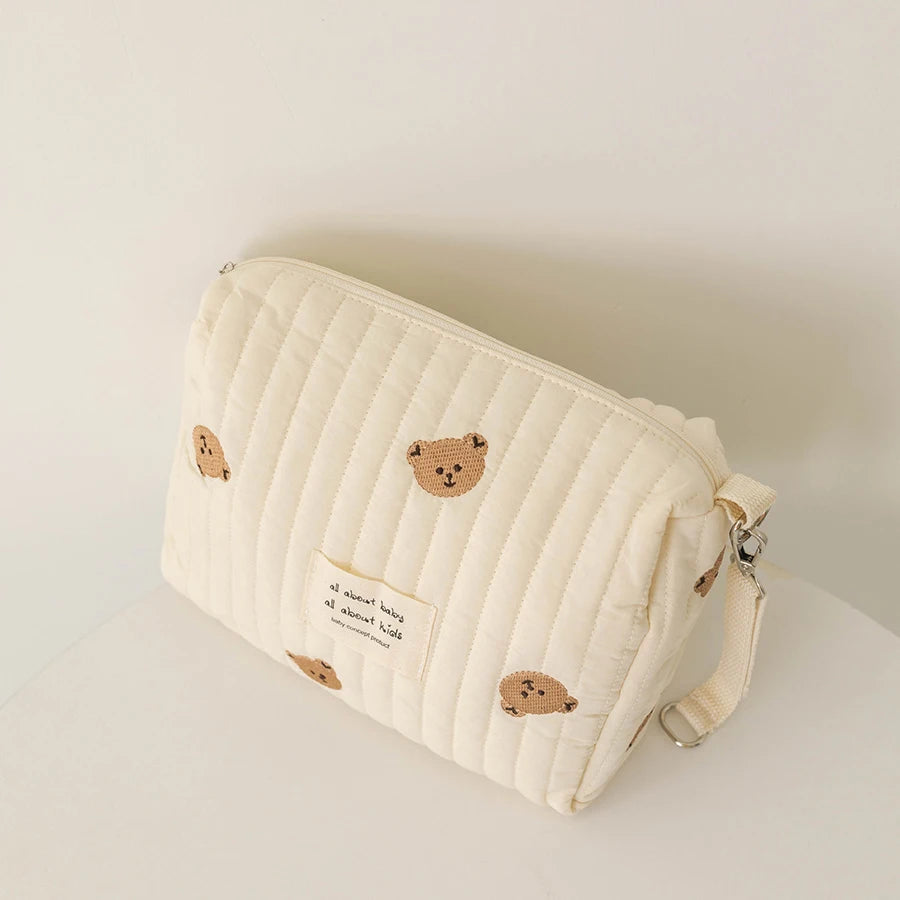 Mini sac à langer bébé | Pochette matelassée pratique & élégante