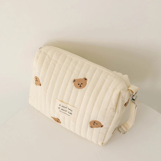 Mini sac à langer bébé | Pochette matelassée pratique & élégante