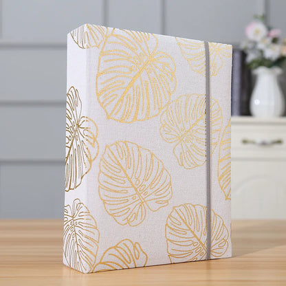 Album Photo “Feuilles Dorées” – Livre Luxe Naissance™