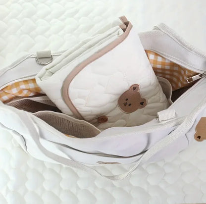 Cocon Nomade Douce Ourson™ – Tapis à langer pliable & réversible | BabySoft