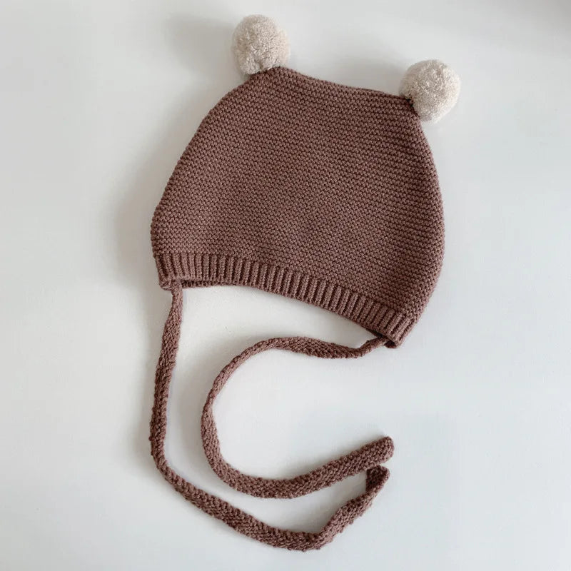 Bonnet Bébé d'Hiver à Pompons