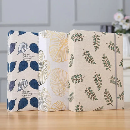 Album Photo “Feuilles Dorées” – Livre Luxe Naissance™