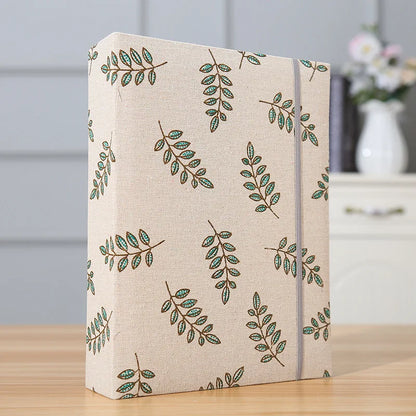 Album Photo “Feuillage Vert” – Livre Souvenir Éco-Chic Bébé™