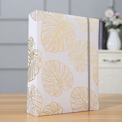 Album Photo “Feuilles Dorées” – Livre Luxe Naissance™