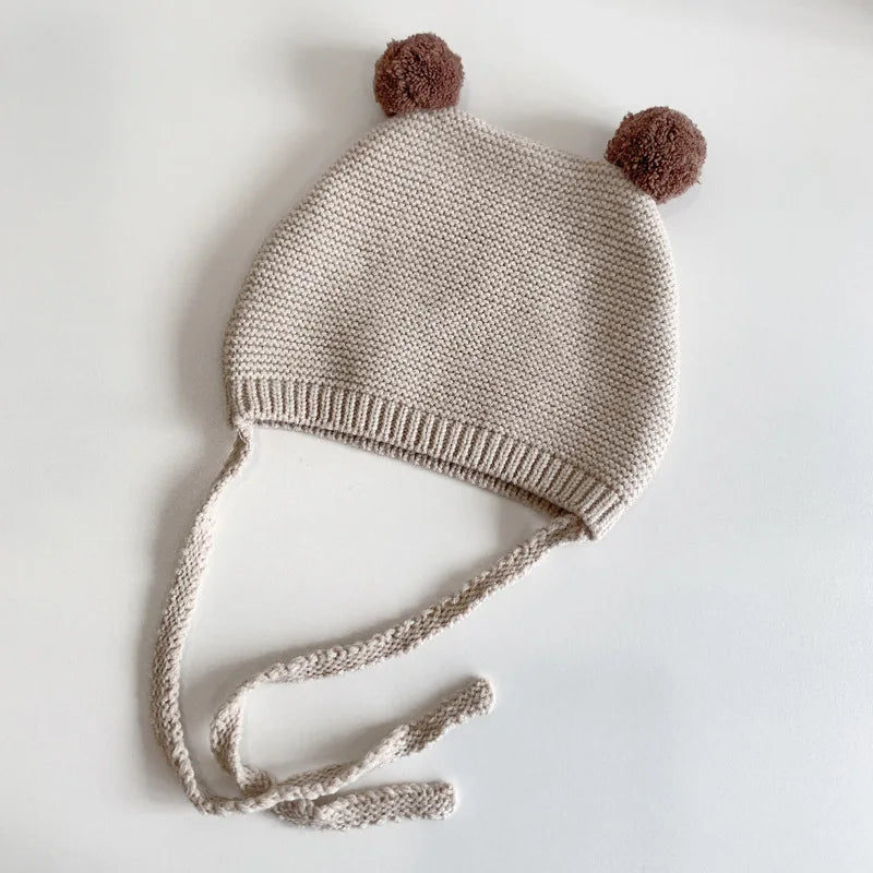 Bonnet Bébé d'Hiver à Pompons